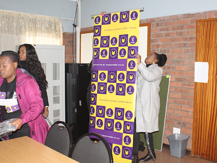 Handover event in Tembisa, learners receiving jerseys