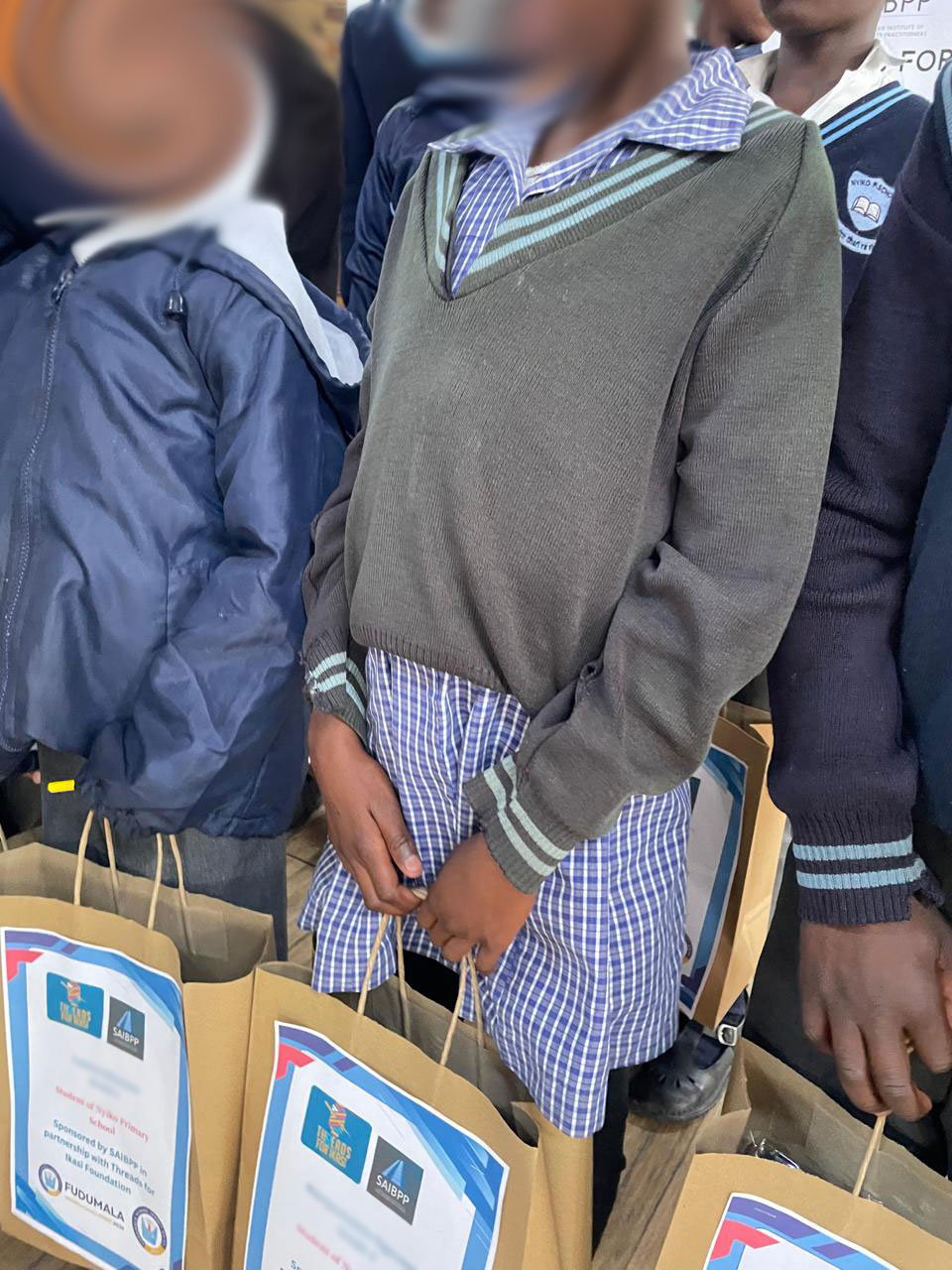 Learners of Nyiko Primary School with their Fudumala Packs