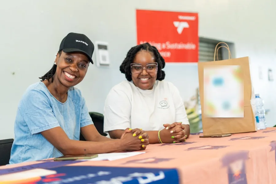 Threads for iKasi Foundation representatives at the registration table at the Tshepisa Primary School handover